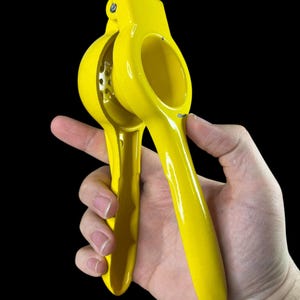 Vintage Yellow Cast Iron Lemon Squeezer: 1970s Pop Art Kitchen Decor