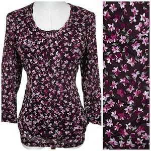 May include: A rustic wooden sign with the text "Welcome to our home" in white lettering. The sign features a distressed finish and a simple, inviting design, perfect for front door decor.