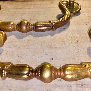 Set of two vintage absolutely gorgeous beautiful, almost could be jewelry, furniture pull handles. SOLID heavy brass. Again Gorgeous!!!