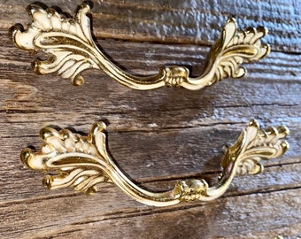 Vintage gold and white leaf French Provincial hardware bars.