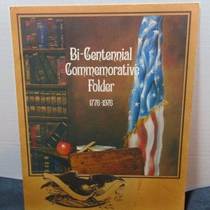 Carpeta conmemorativa del bicentenario de Olan Mills 1776-1976 Documentos División Escolar.