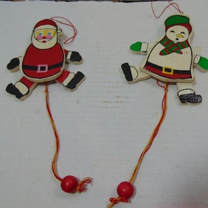 Santa and Snowman Jumping Jack Thick Wooden Pull Christmas Ornaments Vintage 80s