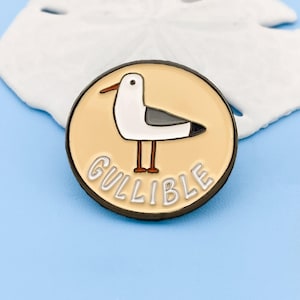 Gullible Pin - Enamel Brooch, Bird Lover Gift, Quirky Fashion Accessory, Handcrafted Lapel Pin, Cute Avian, Playful Gift for Bird Lovers