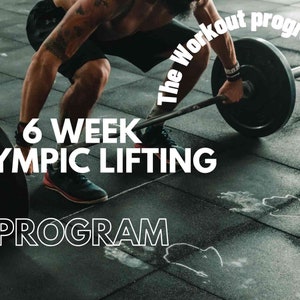 May include: Image promoting a 6-week Olympic lifting program. A person is lifting a barbell with weights in a gym setting. The text "6 Week Olympic Lifting Program" is displayed in white, along with "The Workout program store".