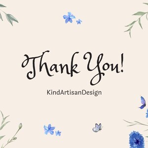 May include: A rectangular card with a cream background featuring the text Thank You! and KindArtisanDesign in black script. The design is decorated with watercolor illustrations of blue cornflowers, orange blossoms, and small butterflies.