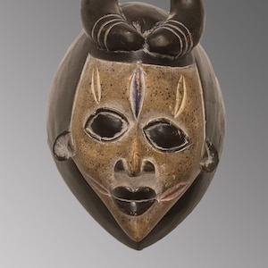African mask from Nigeria 1980 circa. Igbo People. Wooden mask - african art, wall decoration