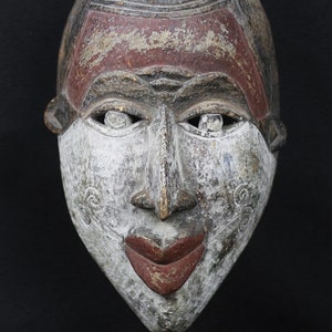 African mask from Nigeria 1970 circa. Igbo People. Wooden decorated mask - african art, wall decoration