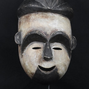 African mask from Nigeria 1970 circa. Yoruba People. Wooden spirit mask - african art, wall decoration