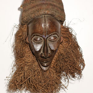 African mask from Angola. 1950 circa. Old wooden Chokwe mask - african ethnic art