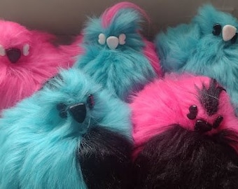 Round furred bird plushies