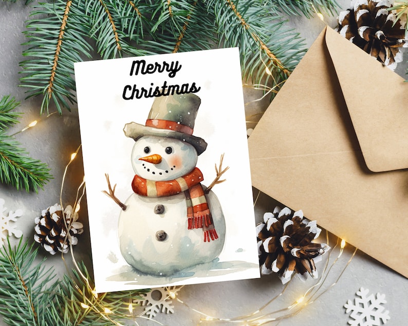 Puede incluir: Una ilustraci&oacute;n de acuarela de un mu&ntilde;eco de nieve con un sombrero de copa negro con una banda roja y blanca, una bufanda roja y una nariz de zanahoria. El texto "Merry Christmas" est&aacute; escrito encima del mu&ntilde;eco de nieve.