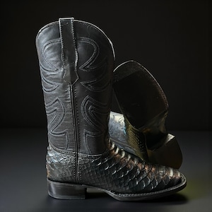 May include: Black cowboy boots with a textured, scaly pattern on the lower portion and smooth leather on the upper shaft. The boots have decorative stitching and a stacked heel. The boots are approximately 30 cm tall.