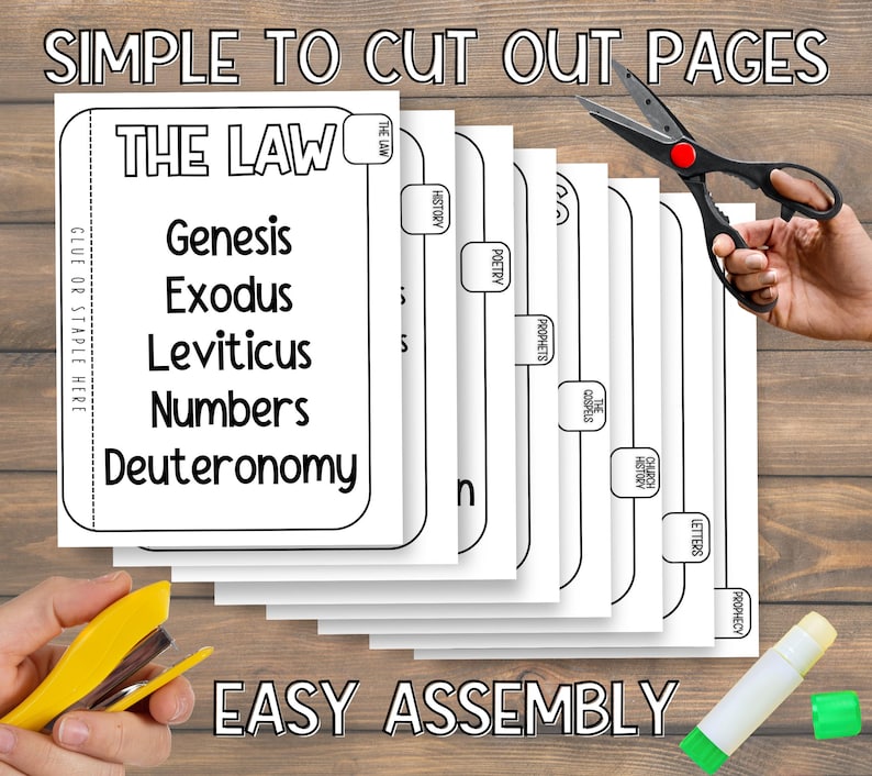 May include: A stack of white paper pages with black text, labeled "THE LAW" and listing Genesis, Exodus, Leviticus, Numbers, and Deuteronomy. The words "SIMPLE TO CUT OUT PAGES" and "EASY ASSEMBLY" are also visible. A pair of scissors and a stapler are in the image.