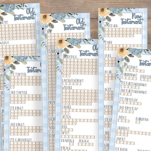 May include: Bible study charts with the text "Old Testament" and "New Testament" in a decorative script. The charts have a blue and white gingham border and floral accents. Each chart lists the books of the Bible.