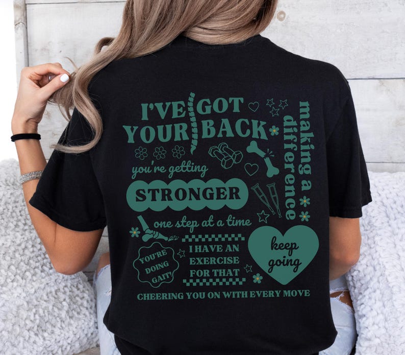 May include: Black t-shirt with a green graphic print that says "I've got your back* making a difference* you're getting stronger one step at a time you're doing gait I have an exercise for that keep going cheering you on with every move"