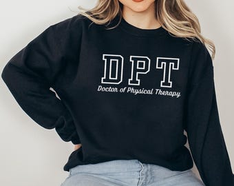 May include: Black sweatshirt with white text that reads "DPT Doctor of Physical Therapy".