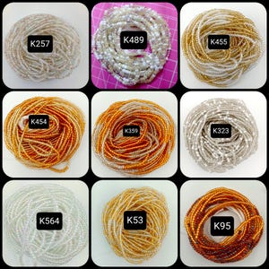 May include: Nine different strands of beads, each in a different color combination of gold, white, and brown. Each strand is labeled with a code, such as "K257", "K489", "K455", "K454", "K359", "K323", "K564", "K53", and "K95".
