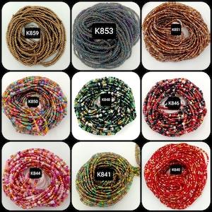May include: Nine different strands of colorful beads, each wrapped in a circle. The beads are various colors and patterns, including red, green, blue, black, white, gold, and brown. Each strand is labeled with a number, such as "K859", "K853", "K851", "K850", "K848", "K846", "K844", "K841", and "K840".