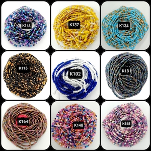May include: Nine different styles of colorful beaded waist beads, each wrapped in a circle. The beads are in various colors and patterns, including black, gold, blue, white, pink, and purple. Each bead strand is labeled with a unique code, such as K143, K137, K134, K115, K102, K18, K164, K148, and K145.