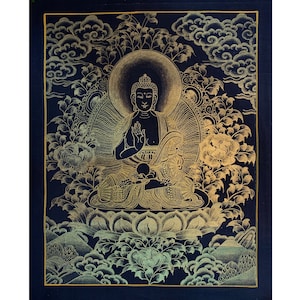 May include: A gold Buddha statue on a blue background. The Buddha is seated in a lotus position with his hands in a mudra gesture. The statue is surrounded by intricate floral designs and clouds.