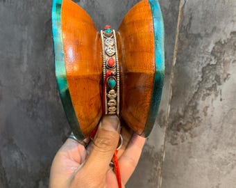 tantric hand drum for daily practice. vajrayana ritual drum made of acacia and goat skin.