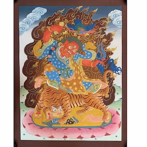 May include: A vibrant painting depicting a deity with a red face, blue robes, and multiple arms, seated on a tiger. The artwork features a fiery background, a blue bird, and a lotus flower base. The style is reminiscent of traditional religious art.