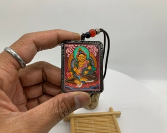 Red theme Mini Dzambhala thangka pendant. hand painted mini jambhala. god of wealth, kuber. protection amulet, for prosperity and success.