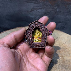 Best quality Dzambhala Tsatsa with ghau pendant. Hand made tsatsa and traditional ghau box. God of wealth. filled with rare blessing items.
