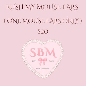 May include: A pink graphic with the text "RUSH MY MOUSE EARS (ONE MOUSE EARS ONLY)" in a decorative font. Below is a heart-shaped logo with the letters "SBM", a bow, and the words "EST. 2022 Park Essentials".
