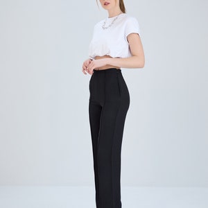 Linen pants with stitch detail. Linen trousers with stitching on the front and pockets. Provides comfort with hidden zipper on the side.