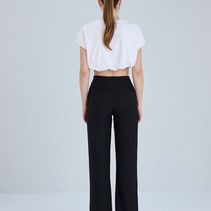 Linen pants with stitch detail. Linen trousers with stitching on the front and pockets. Provides comfort with hidden zipper on the side.