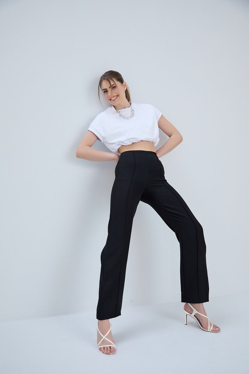 Linen pants with stitch detail. Linen trousers with stitching on the front and pockets. Provides comfort with hidden zipper on the side.