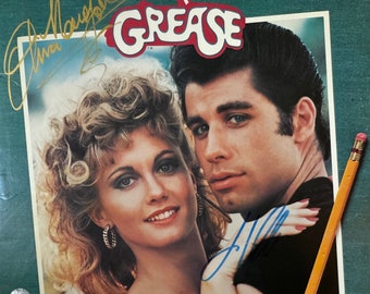 LP autografiado de "Grease" por John Travolta y Olivia Newton-John (certificado de autenticidad)