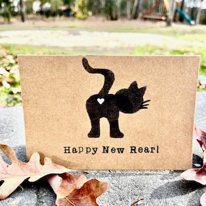 Tarjeta con trasero de gato, trasero de gato, trasero de corazón, feliz año nuevo, para la caída de la bola, divertida tarjeta de fin de año de Katnip Ink