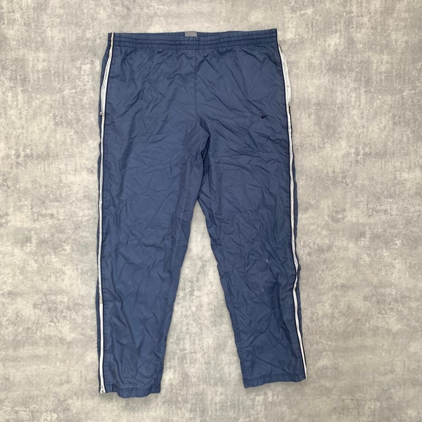 Nike track pant joggers hombre L azul y2k vintage streetwear streetstyle pantalones de taladro de los años 90 con defecto!