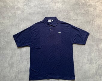 T-shirt polo Lacoste manches courtes taille XL bleu marine des années 80 y2k vintage streetstyle des années 90 drill opium rétro