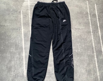 Nike track pantalón joggers gran logotipo tamaño de hombre Grande negro 80s y2k vintage streetstyle 90s taladro opio retro nylon