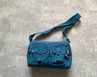 Kipling women’s crossbody bag turquoise blue navy medium size 80s y2k vintage streetstyle 90s drill opium retro
