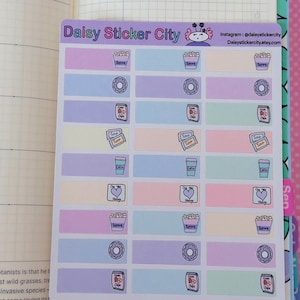 May include: A sheet of planner stickers with pastel-colored rectangular labels. Each label features a small icon of food items like fries, donuts, coffee, and hearts. The sheet is labeled "Daisy Sticker City" with social media information.