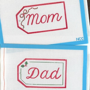 May include: A set of three ceramic mugs with a speckled, matte finish. The mugs are in shades of cream, light gray, and dark gray. Each mug has a simple, minimalist design, perfect for coffee or tea.