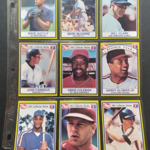 May include: A collection of nine baseball trading cards from the 1991 Post Collector Series, featuring various players. Each card has a yellow border and includes the player's name, team, and the Post logo. The cards are displayed in a clear plastic sheet.