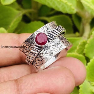 Anello girevole fatto a mano con pietra preziosa rubino: fascia a forma di fiore in argento sterling 925