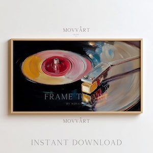 May include: A framed painting of a vintage record player. The record is black with a red and yellow center. The tone arm is silver and gold. The text "FRAME TV" and "INSTANT DOWNLOAD" are visible.