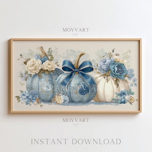 Puede incluir: Una impresión enmarcada con tres calabazas decorativas con arreglos florales. Las calabazas están pintadas en tonos azules y blancos, adornadas con lazos azules y ramos de flores. La impresión tiene el texto "MOVART" y "INSTANT DOWNLOAD".