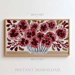 Puede incluir: Pintura enmarcada de un arreglo floral con flores rosas y burdeos en un jarrón a rayas. La obra de arte tiene un marco marrón claro e incluye el texto "MOVART" y "INSTANT DOWNLOAD".