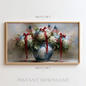 May include: A framed digital art print featuring a floral arrangement with American flags and red ribbons. The artwork showcases a blue and white vase filled with white and blue flowers. The text "FRAME TV ART" and "INSTANT DOWNLOAD" are visible.