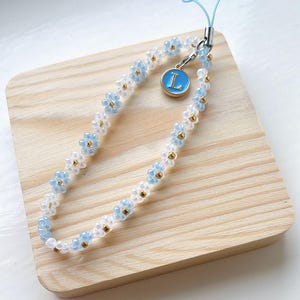 Sky Blue Letter Flower Phone Strap