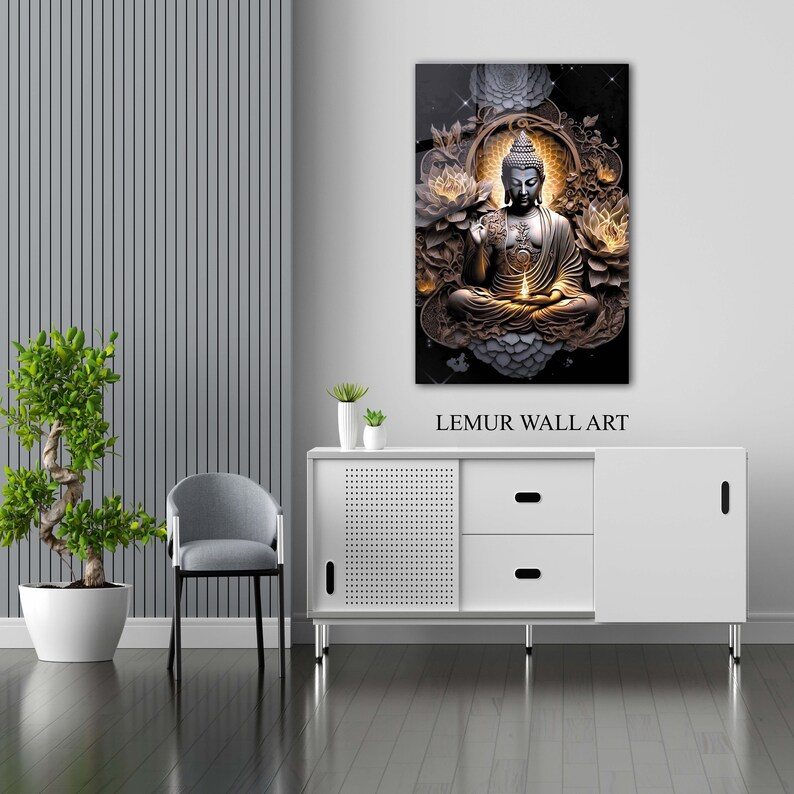 May include: A gold and black framed wall art print featuring a Buddha statue sitting in a lotus position with a candle in front of him. The background is black with gold and white floral designs. The text "LEMUR WALL ART" is below the image.