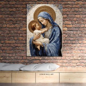 May include: A mosaic artwork depicting the Virgin Mary holding the baby Jesus. The artwork is framed and features a blue and gold color scheme.