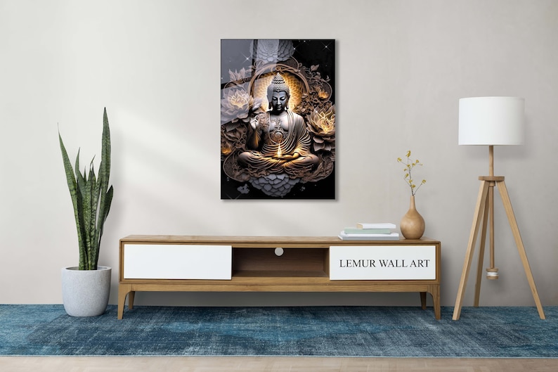 May include: A black and gold glass wall art print featuring a meditating Buddha figure surrounded by white flowers and a golden halo. The print is framed with a black border and has the text "LEMUR WALL ART" at the bottom.